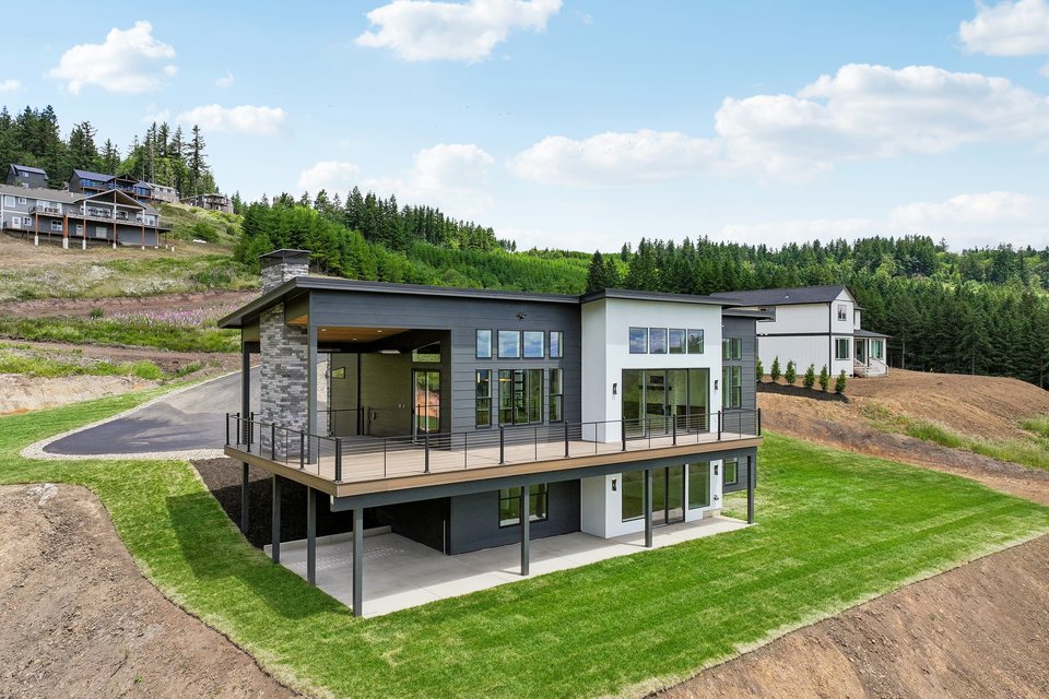Rear exterior of the completed home and elevated homesite